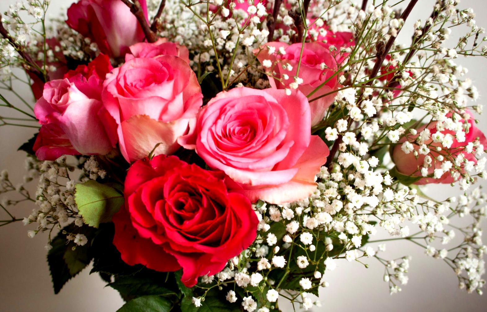 Professional florist working on a custom bouquet arrangement